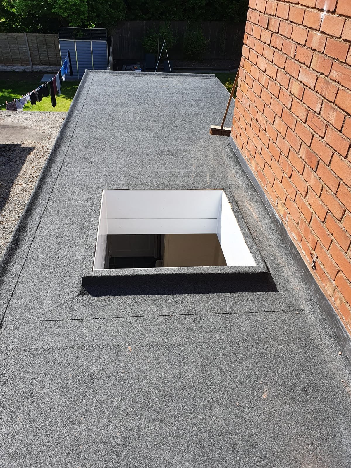 Newly installed flat roof on a modern home extension in London